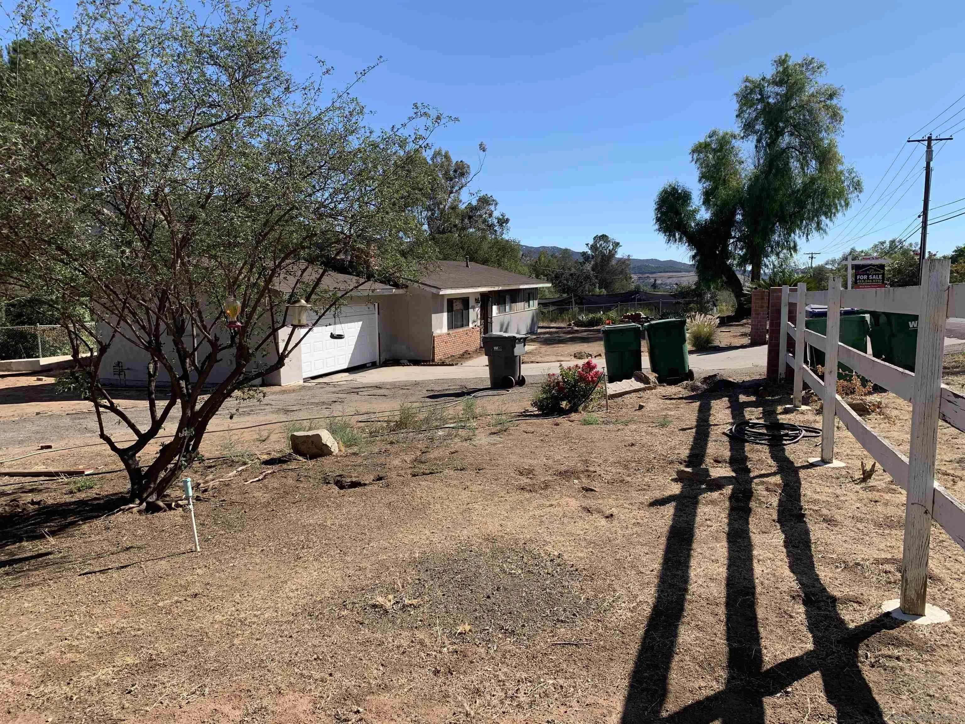 9935 Blossom Valley Road El Cajon, CA 92021 - Photo 27 of 36 a view of a house with a patio