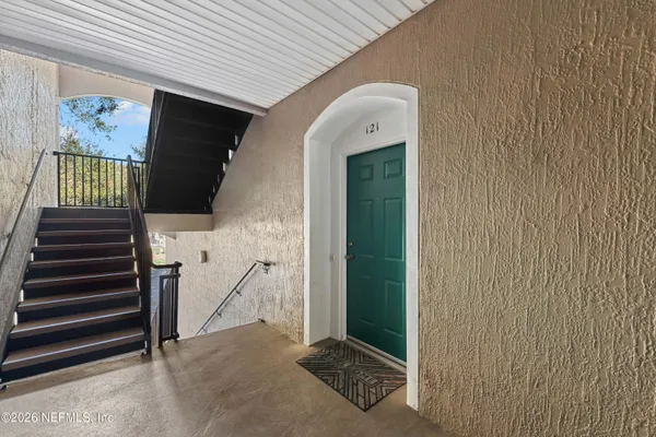 a view of an entryway with stairs