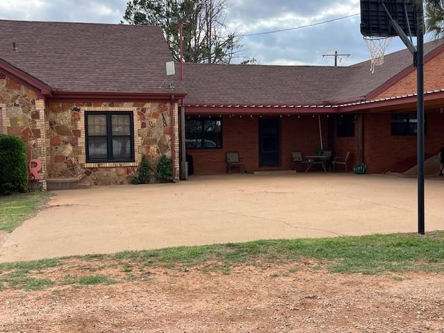 1163 State Highway 70 Rotan, TX 79546 - Photo 5 of 40 private patio at side entry