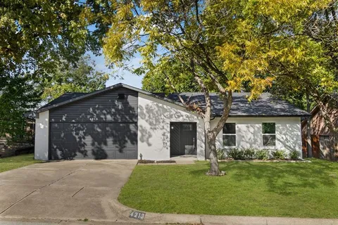 a front view of house with yard