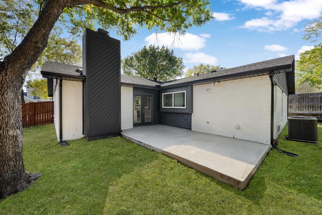 4213 Huckleberry Drive Fort Worth, TX 76137 - Photo 30 of 39 a view of a house with a back yard