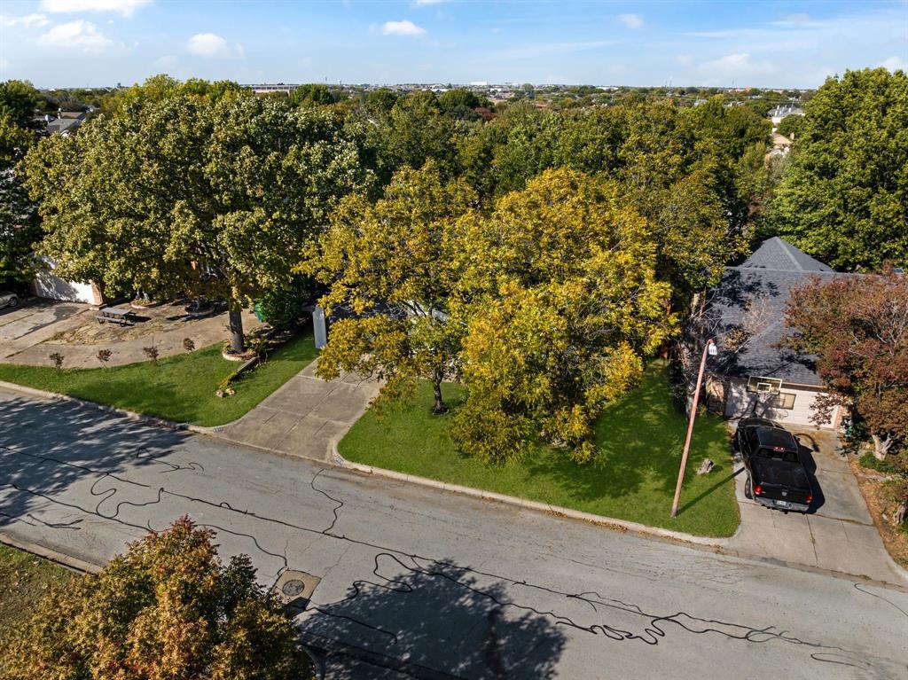 4213 Huckleberry Drive Fort Worth, TX 76137 - Photo 36 of 39 a view of a garden with a pathway
