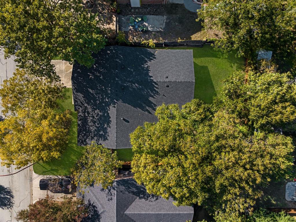 4213 Huckleberry Drive Fort Worth, TX 76137 - Photo 37 of 39 an aerial view of a house with a yard