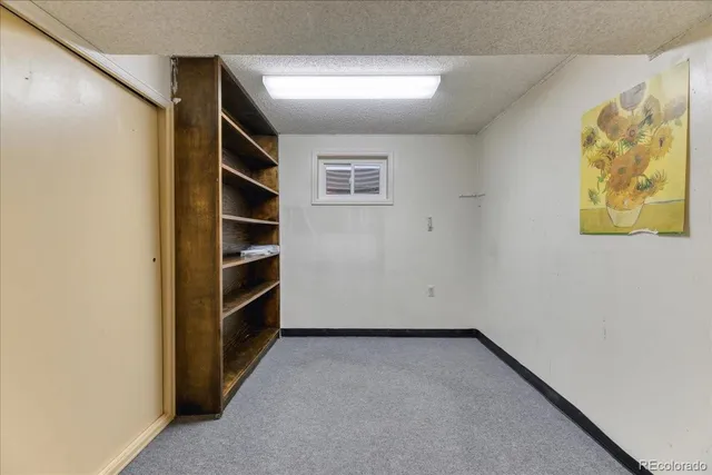 an empty room with a empty shelves