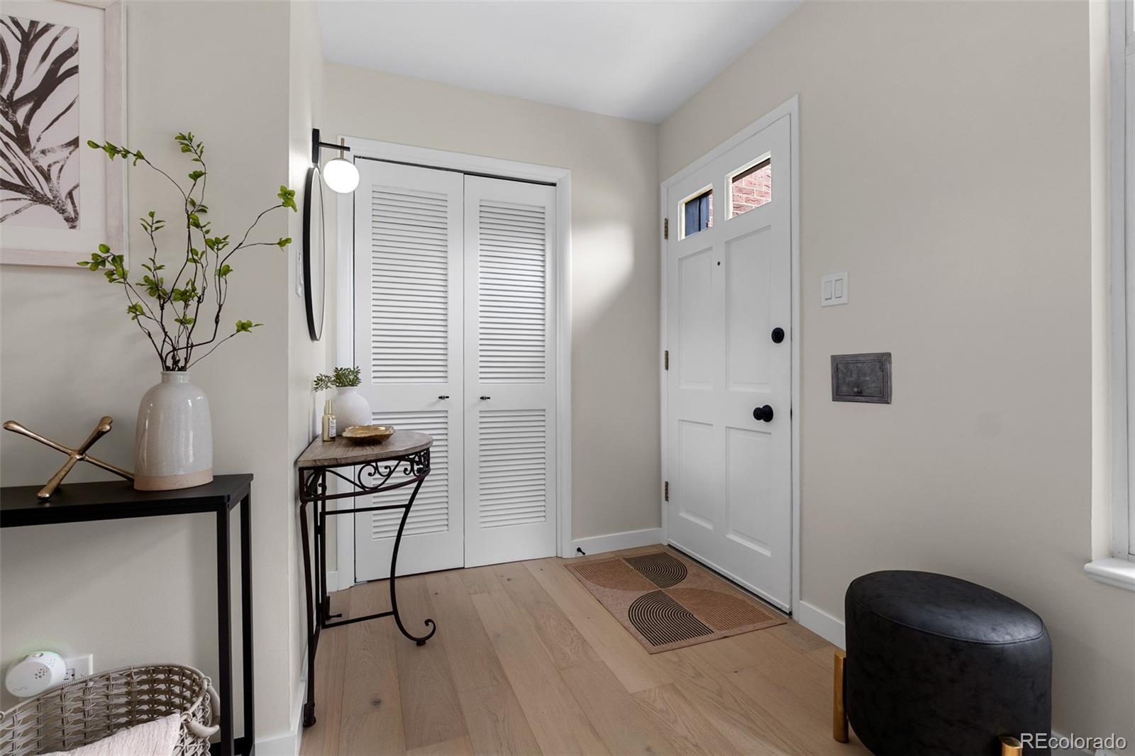 367 North Clarkson Street Denver, CO 80218 - Photo 14 of 50 a view of entryway with wooden floor