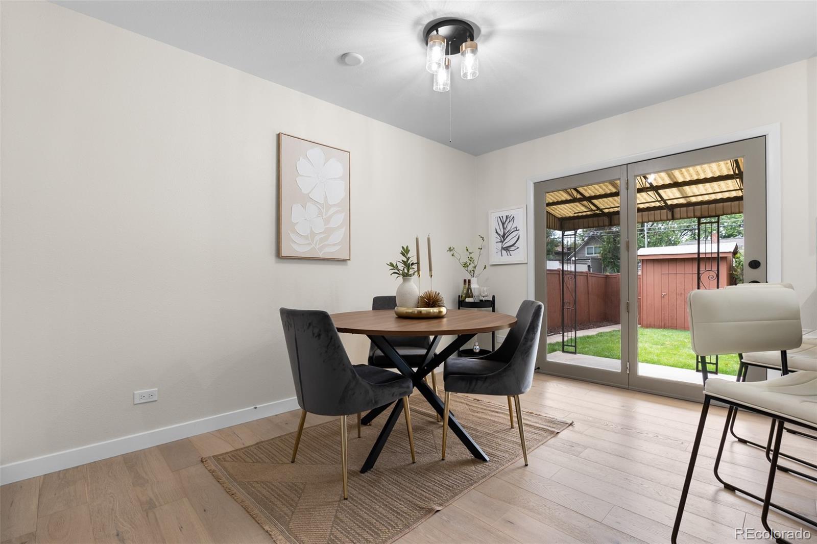 367 North Clarkson Street Denver, CO 80218 - Photo 19 of 50 a view of a dining room with furniture window and wooden floor