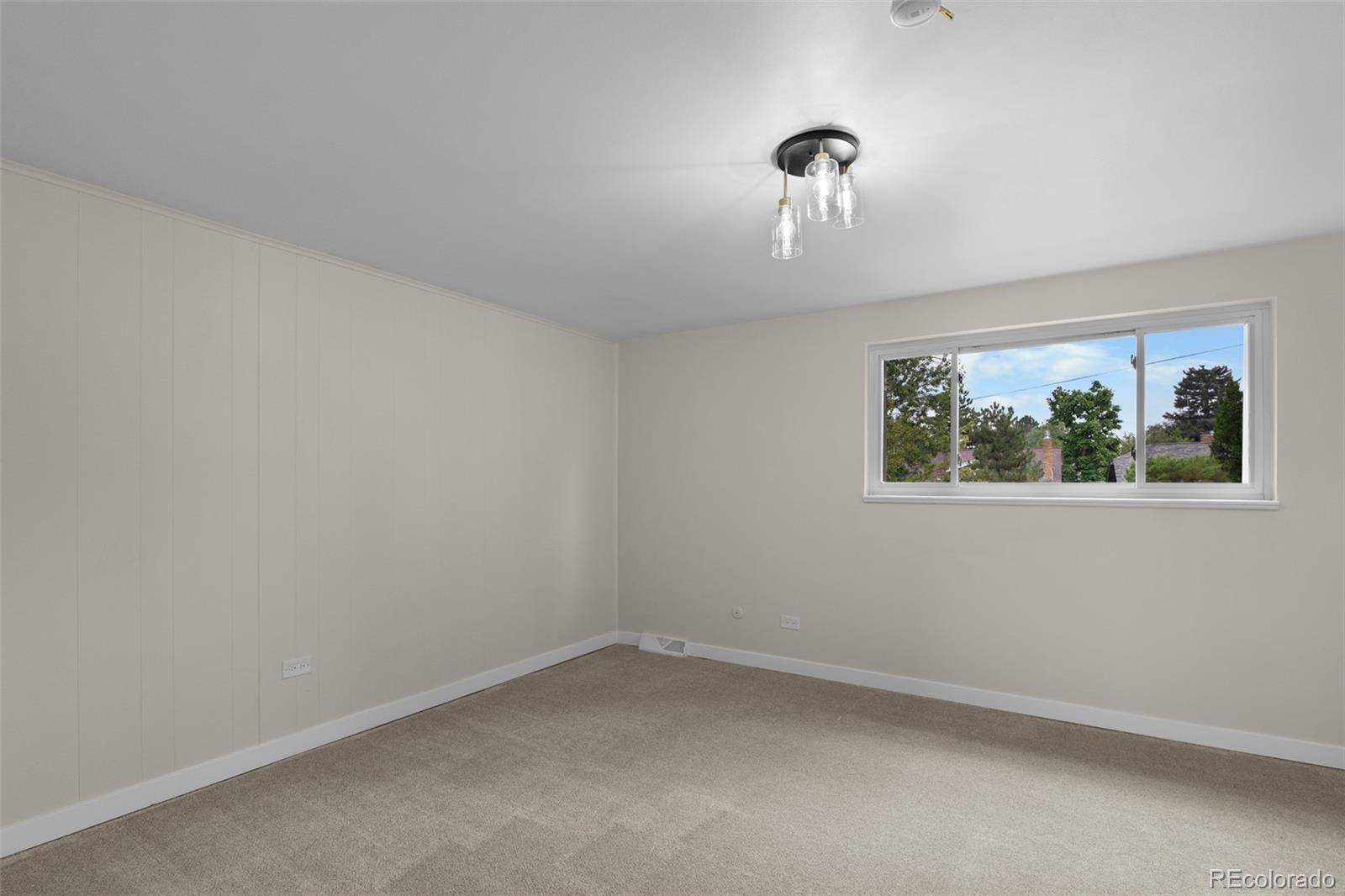 367 North Clarkson Street Denver, CO 80218 - Photo 25 of 50 an empty room with a window