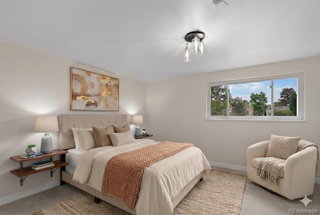 367 North Clarkson Street Denver, CO 80218 - Photo 26 of 50 a bedroom with a bed and a couch