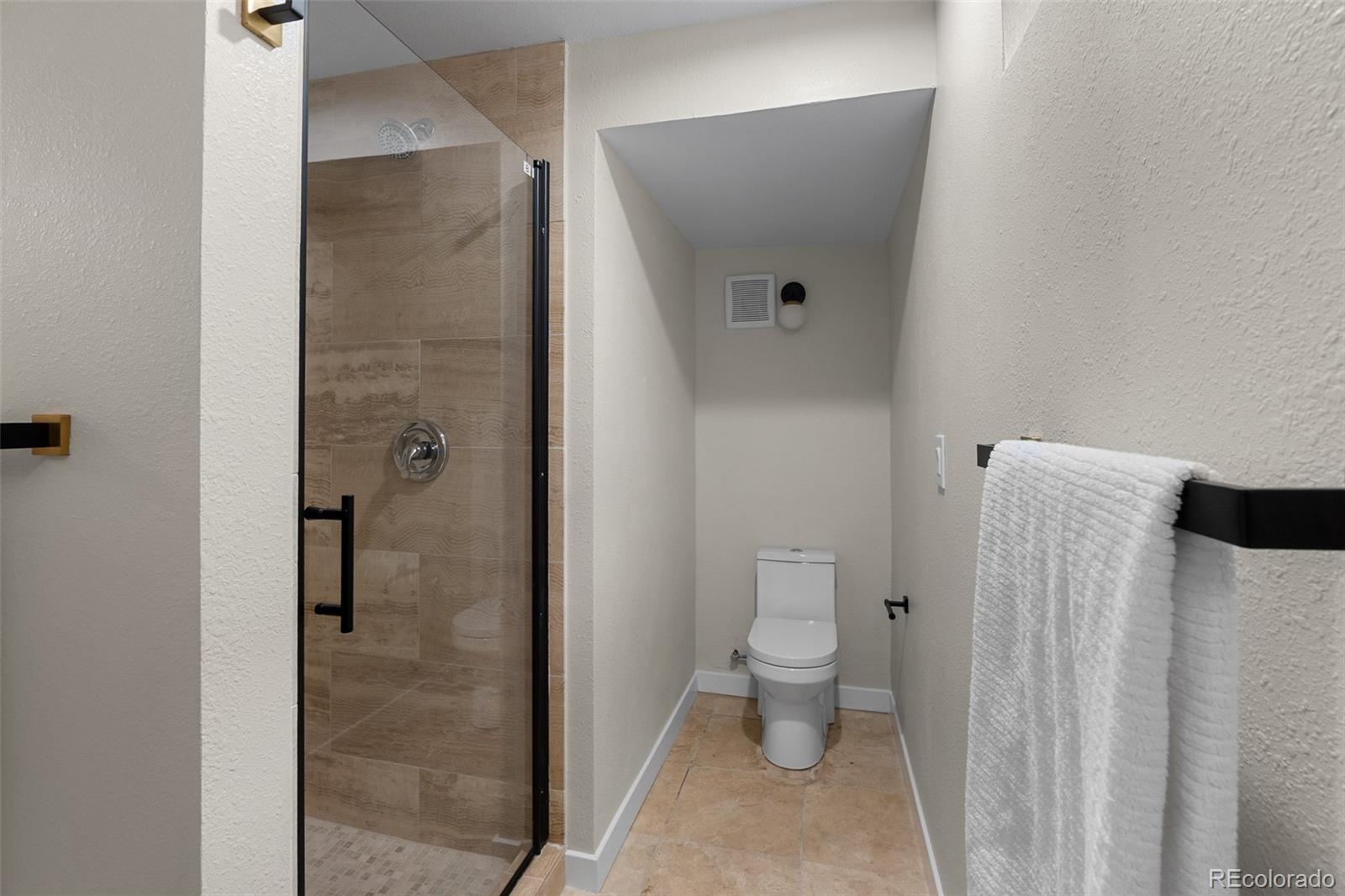 367 North Clarkson Street Denver, CO 80218 - Photo 42 of 50 a bathroom with a toilet and a shower