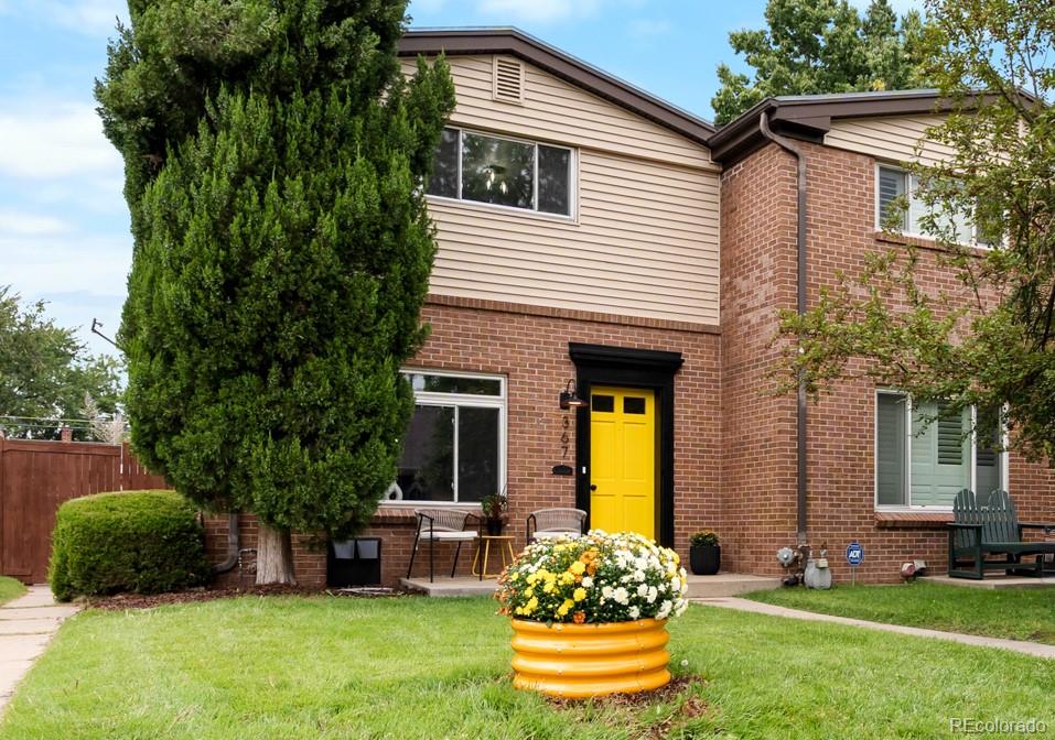 367 North Clarkson Street Denver, CO 80218 - Photo 6 of 50 a front view of a house with a yard
