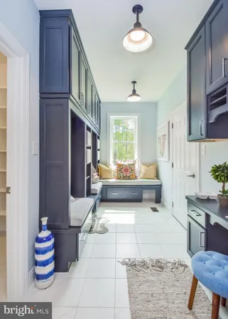 a view of a kitchen with furniture and window