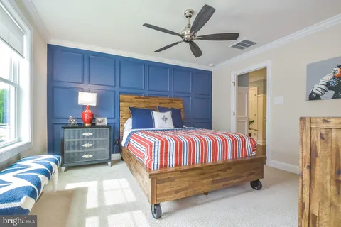 a view of a livingroom with furniture window and wooden floor