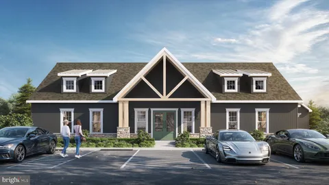 a view of a house with swimming pool and sitting area