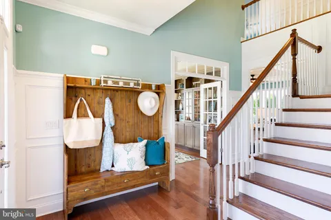 a view of entryway with wooden floor