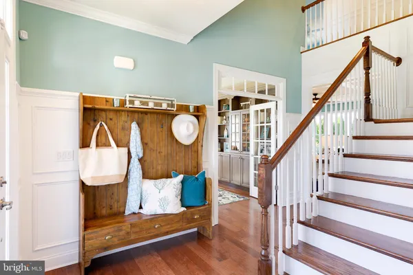 a view of entryway with wooden floor