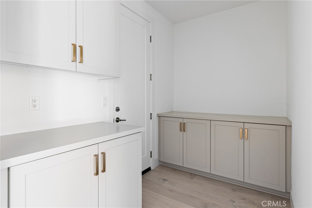 175 East Palm Street Altadena, CA 91001 - Photo 11 of 22 a bathroom with a sink and cabinets