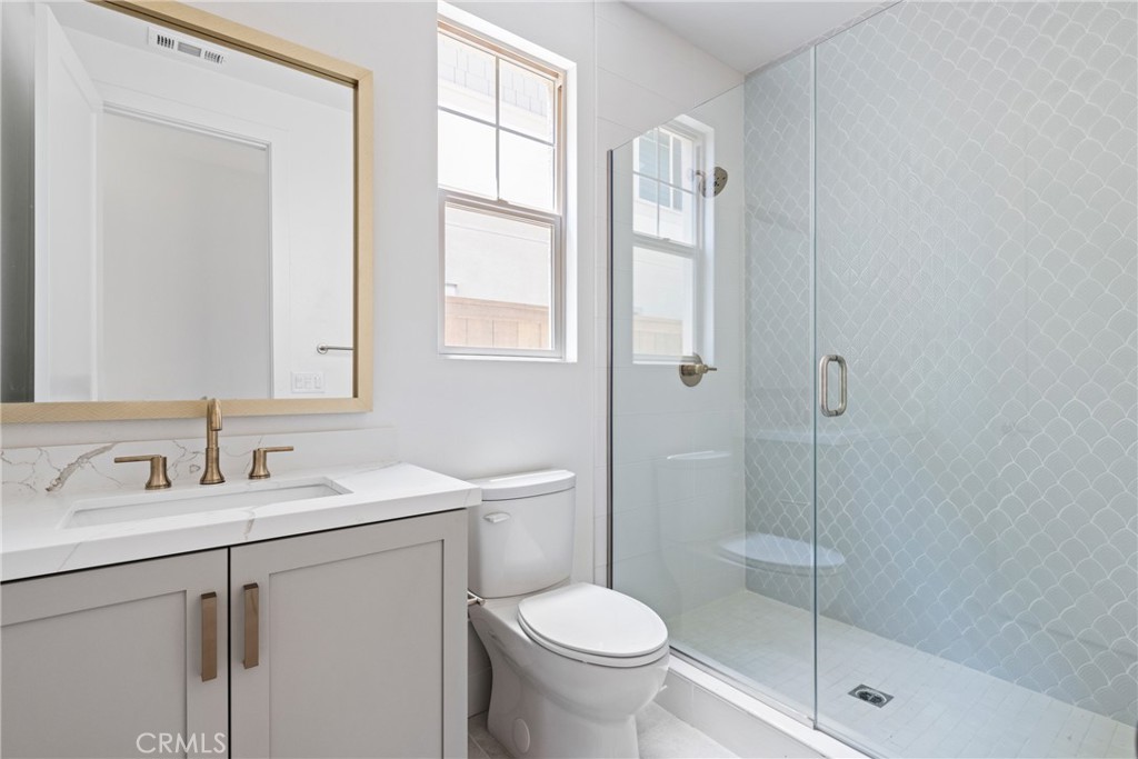 175 East Palm Street Altadena, CA 91001 - Photo 12 of 22 a bathroom with a sink toilet and shower