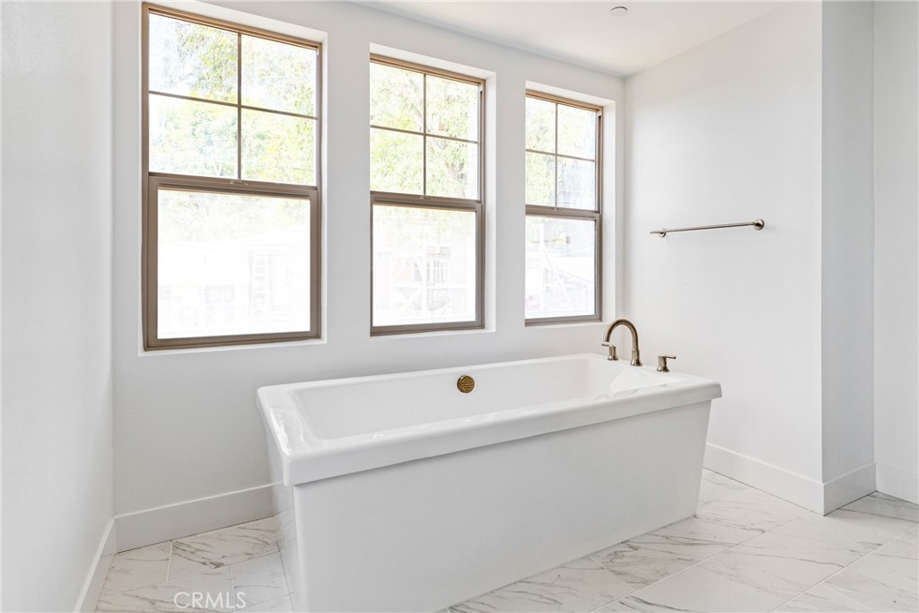 175 East Palm Street Altadena, CA 91001 - Photo 17 of 22 a bathroom with a sink and a bathtub