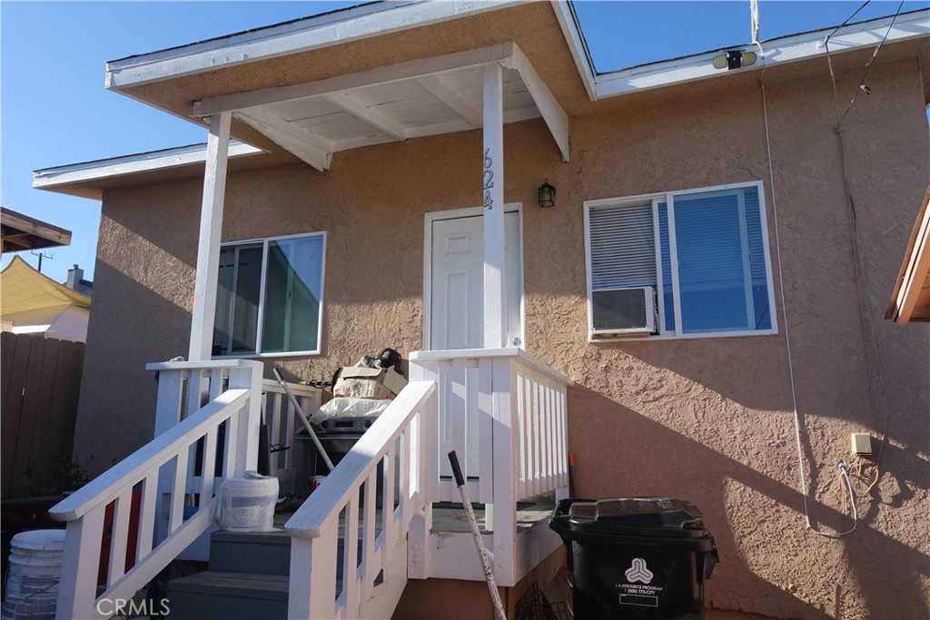 622 West 2nd Street San Pedro, CA 90731 - Photo 11 of 42 a view of balcony with two chairs and stairs