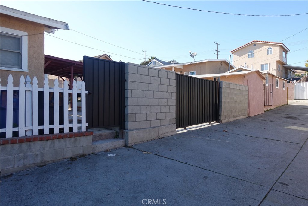 622 West 2nd Street San Pedro, CA 90731 - Photo 14 of 42 a view of a brick house with many windows