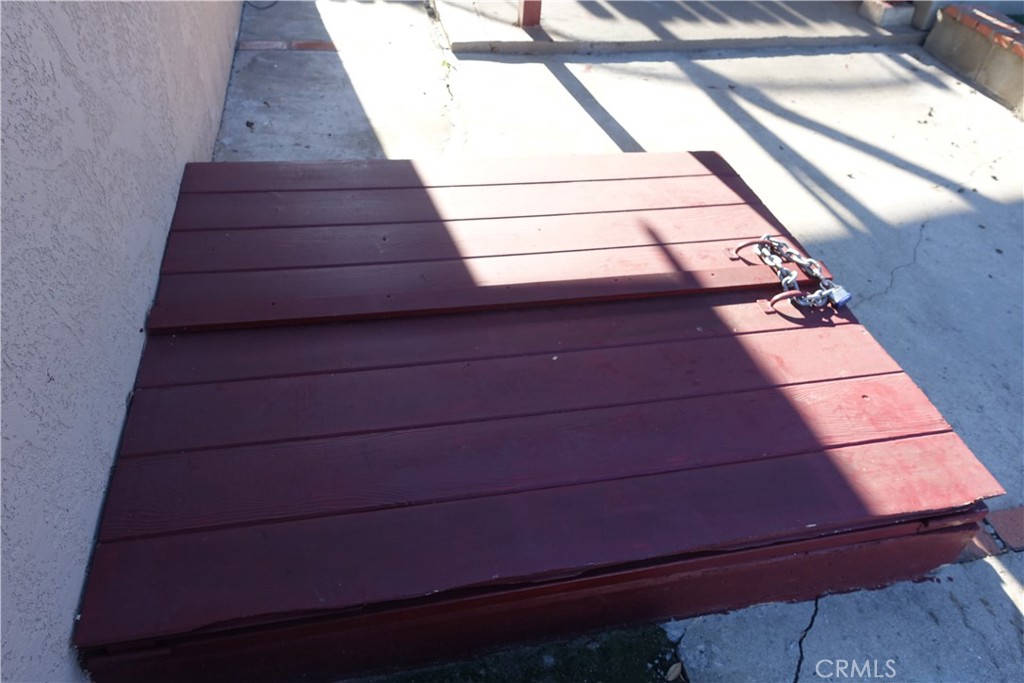 622 West 2nd Street San Pedro, CA 90731 - Photo 34 of 42 a view of a balcony with wooden floor and fence