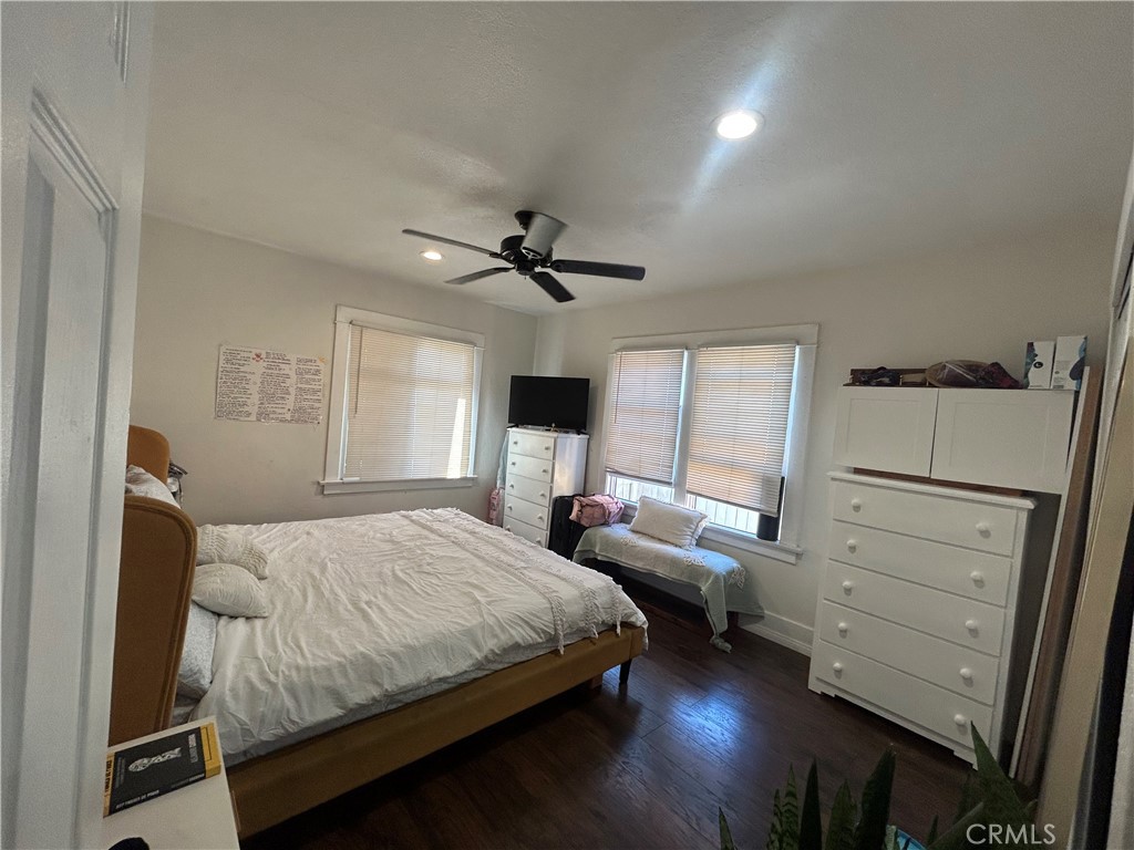 622 West 2nd Street San Pedro, CA 90731 - Photo 42 of 42 a bedroom with a bed and wooden floor