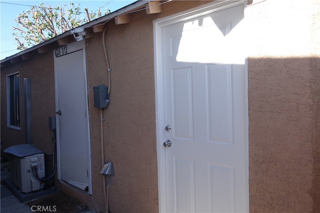 622 West 2nd Street San Pedro, CA 90731 - Photo 9 of 42 a bathroom with a window and a shower