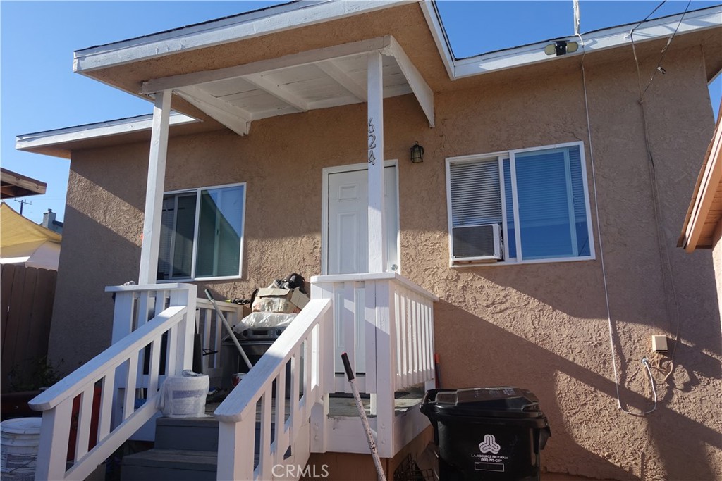 622 West 2nd Street San Pedro, CA 90731 - Photo 10 of 42 a view of balcony with two chairs and stairs