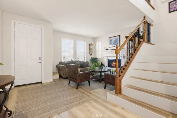 a bedroom with a bed and a chair