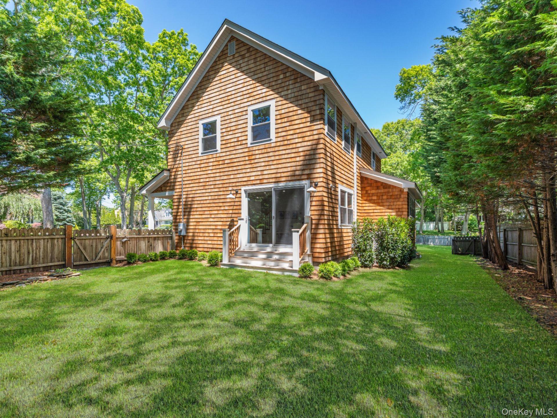 2 Heather Drive Remsenburg, NY 11960 - Photo 36 of 40 a view of a house with a yard