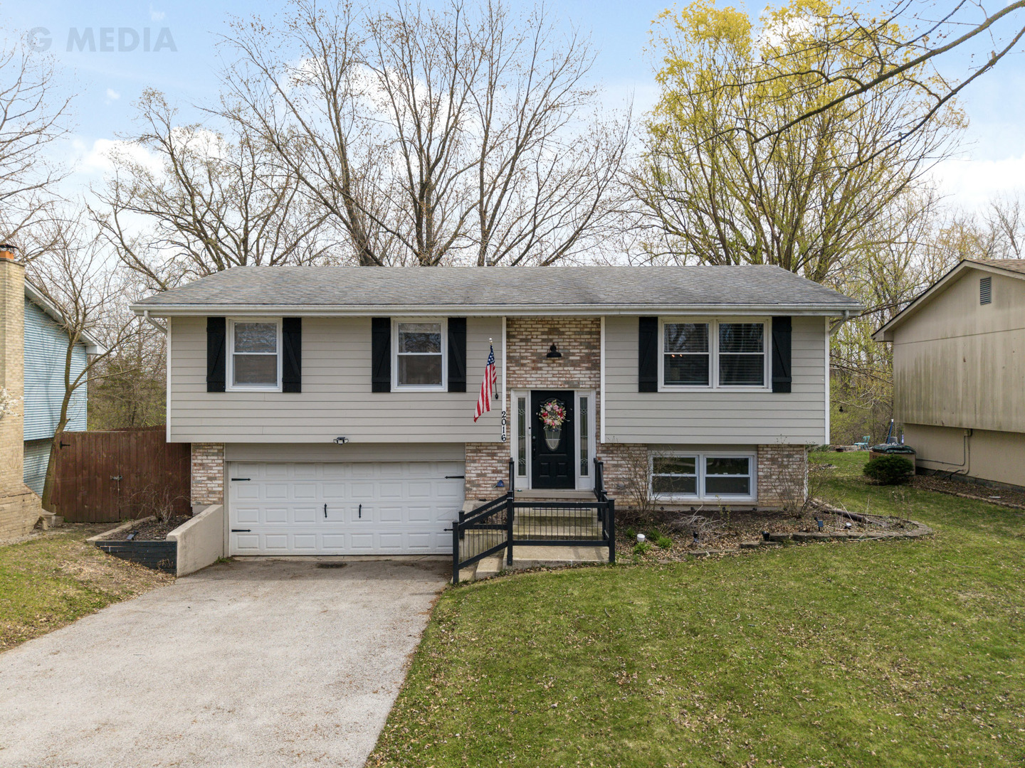 front view of a house with a yard