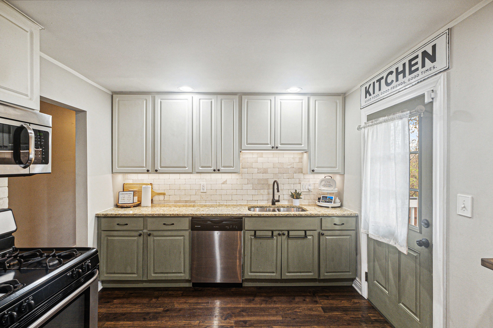 2016 Digby Drive New Lenox, IL 60451 - Photo 11 of 26 a kitchen with stainless steel appliances a sink stove and cabinets
