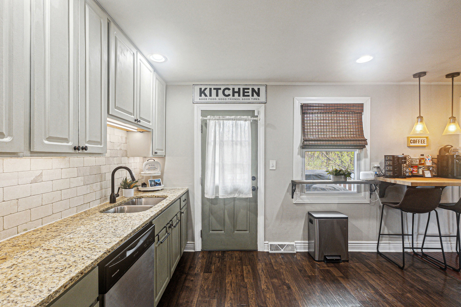 2016 Digby Drive New Lenox, IL 60451 - Photo 12 of 26 a kitchen with granite countertop a stove a sink and a refrigerator