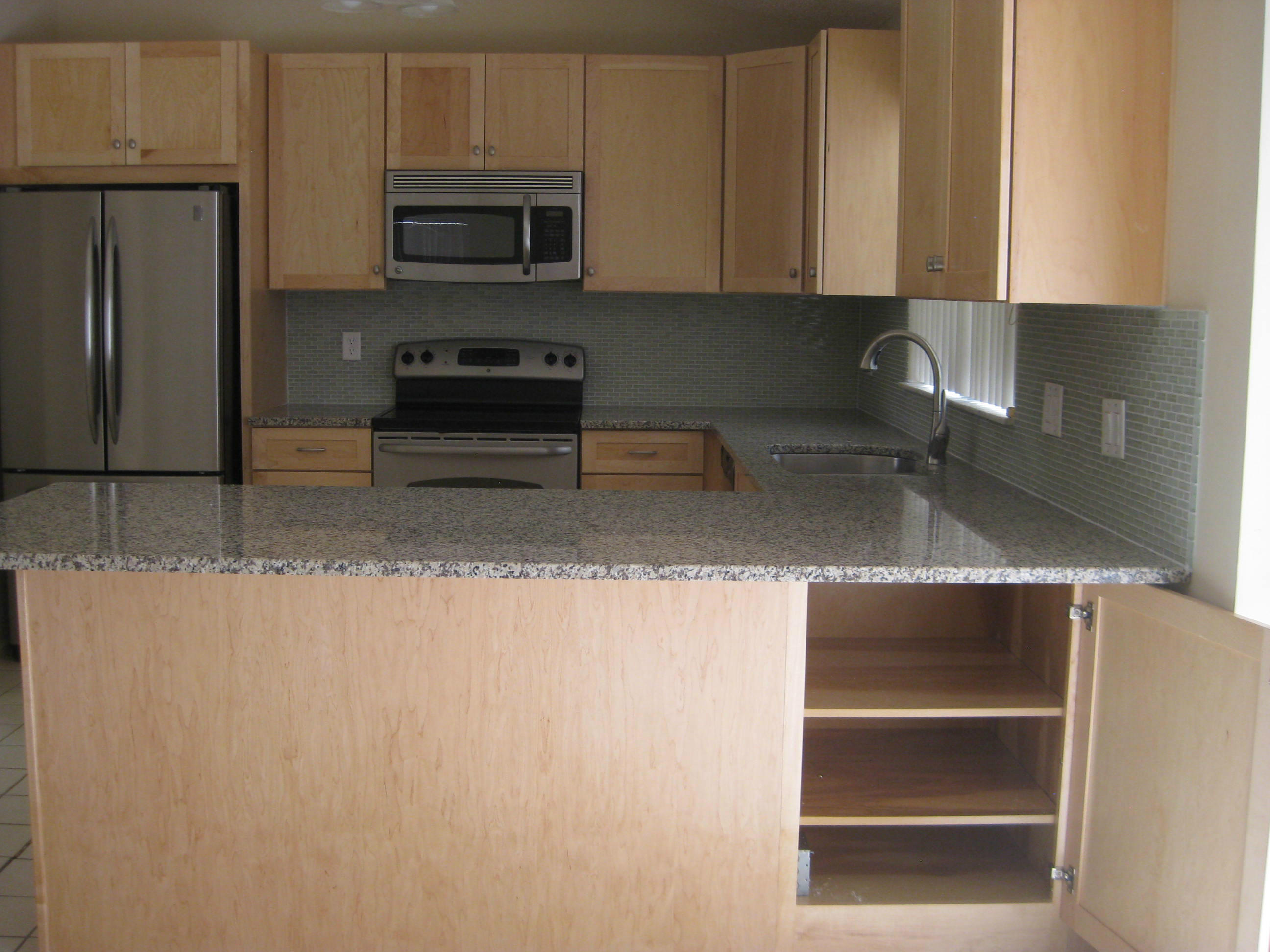 7734 Solimar Circle Boca Raton, FL 33433 - Photo 11 of 25 Kitchen Cabinets / Granite Countertops