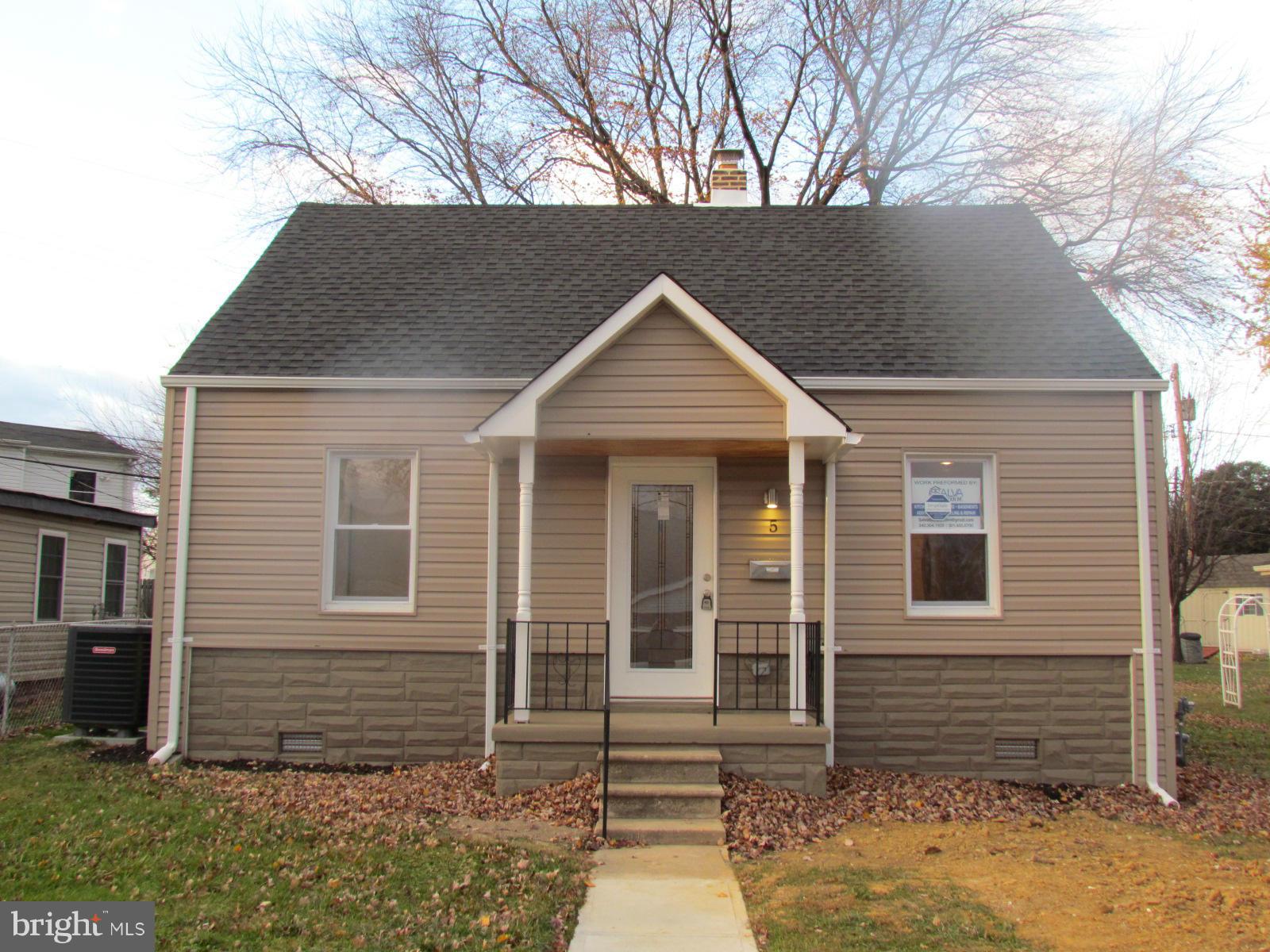 5 Riverside Road Baltimore, MD 21221 - Photo 1 of 28 a front view of a house with garden