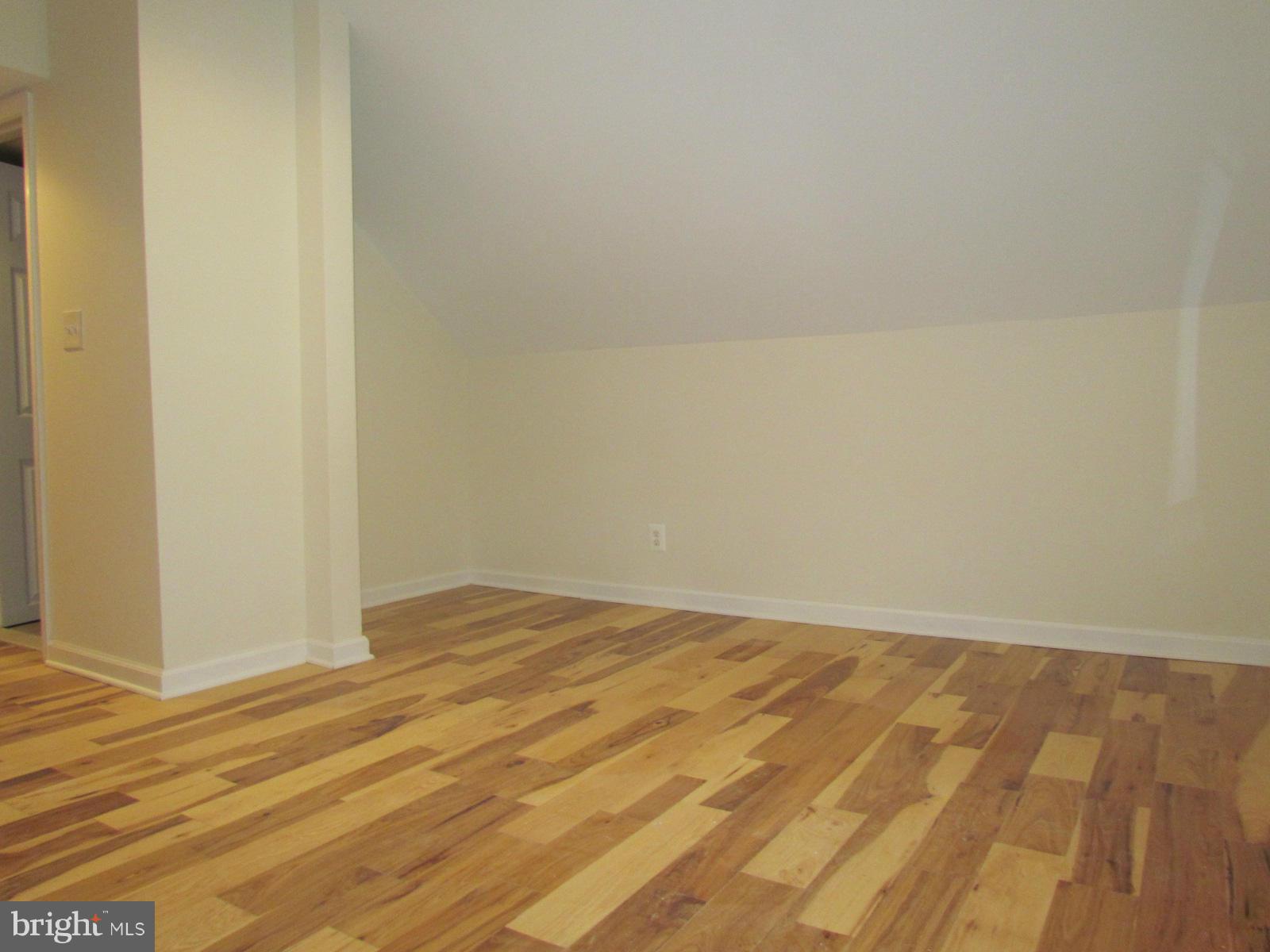 5 Riverside Road Baltimore, MD 21221 - Photo 23 of 28 a view of empty room with wooden floor