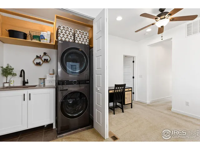 a view of a washer and dryer in a utility room
