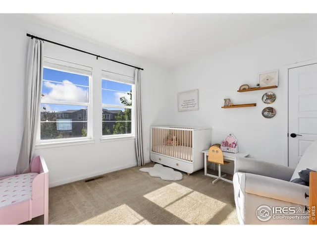 a room with furniture and a window