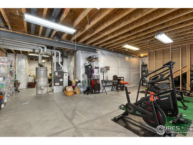 a view of a backyard with sitting area
