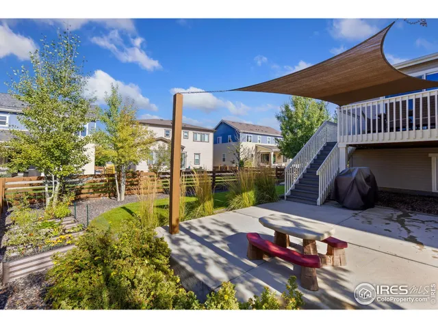a aerial view of a house with a yard