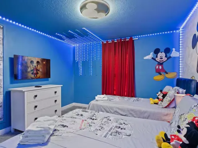 a bedroom with a bed and furniture