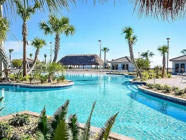 a front view of a building with garden