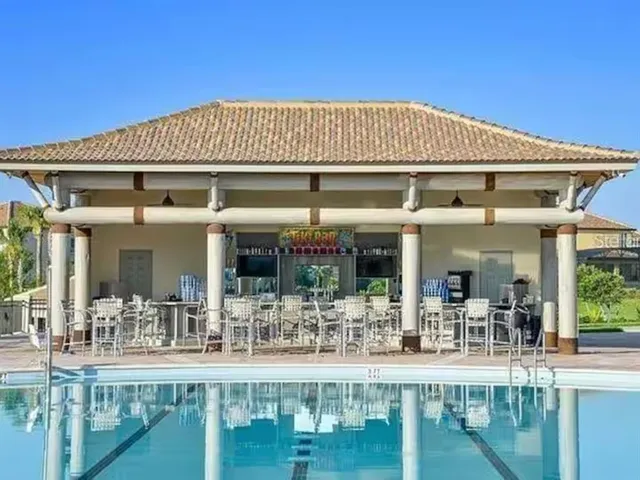 a front view of a house with swimming pool