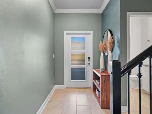 a view of hallway with washer and dryer