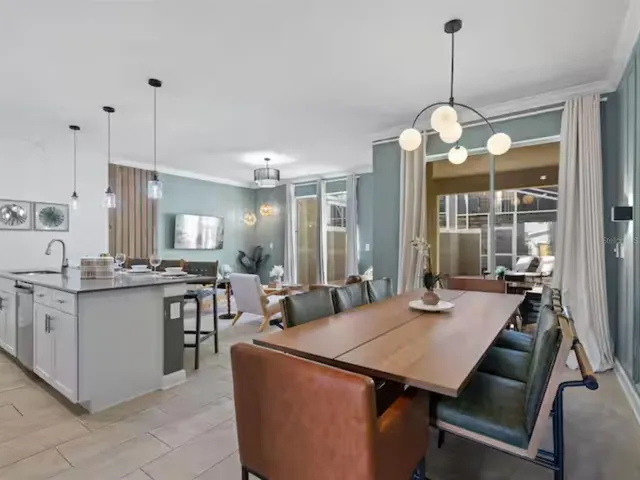 a view of a dining room and livingroom view kitchen