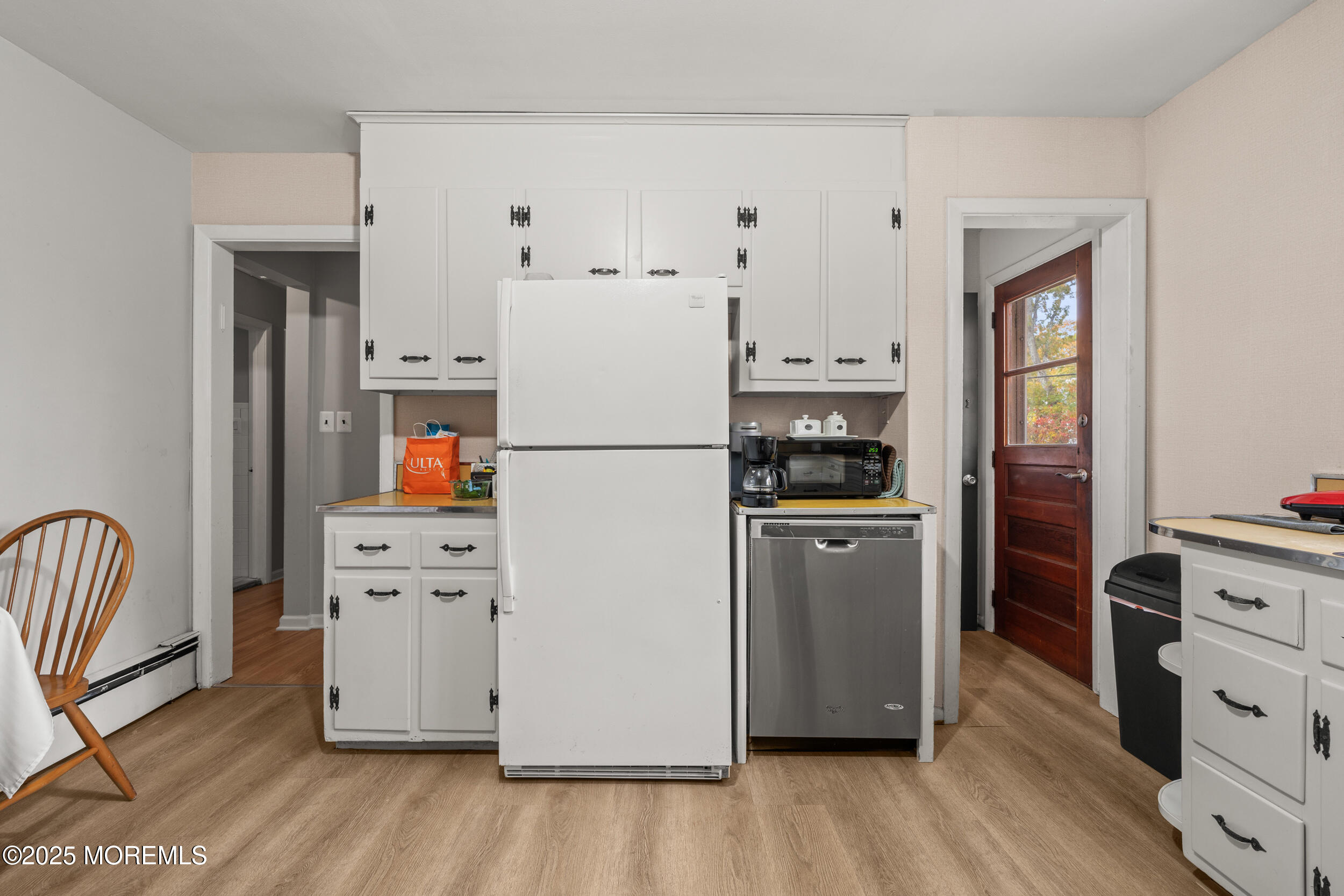 271 Jerome Avenue Oakhurst, NJ 07755 - Photo 15 of 39 a kitchen with stainless steel appliances a refrigerator and a stove top oven