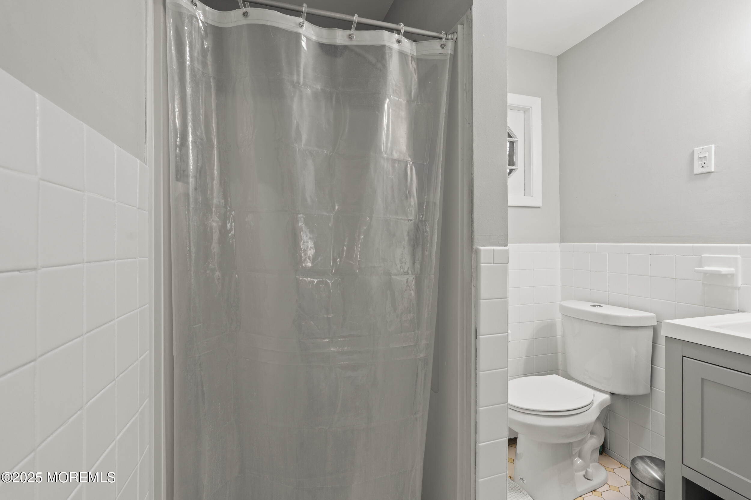 271 Jerome Avenue Oakhurst, NJ 07755 - Photo 22 of 39 a white toilet sitting next to a shower