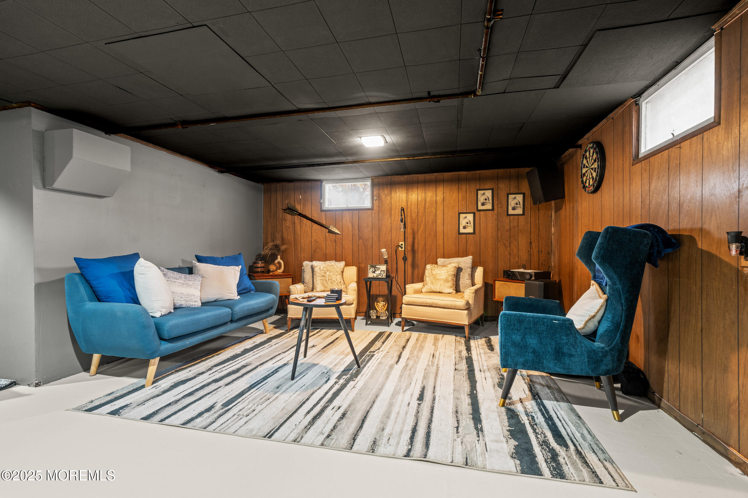 271 Jerome Avenue Oakhurst, NJ 07755 - Photo 27 of 39 a living room with furniture and wooden floor