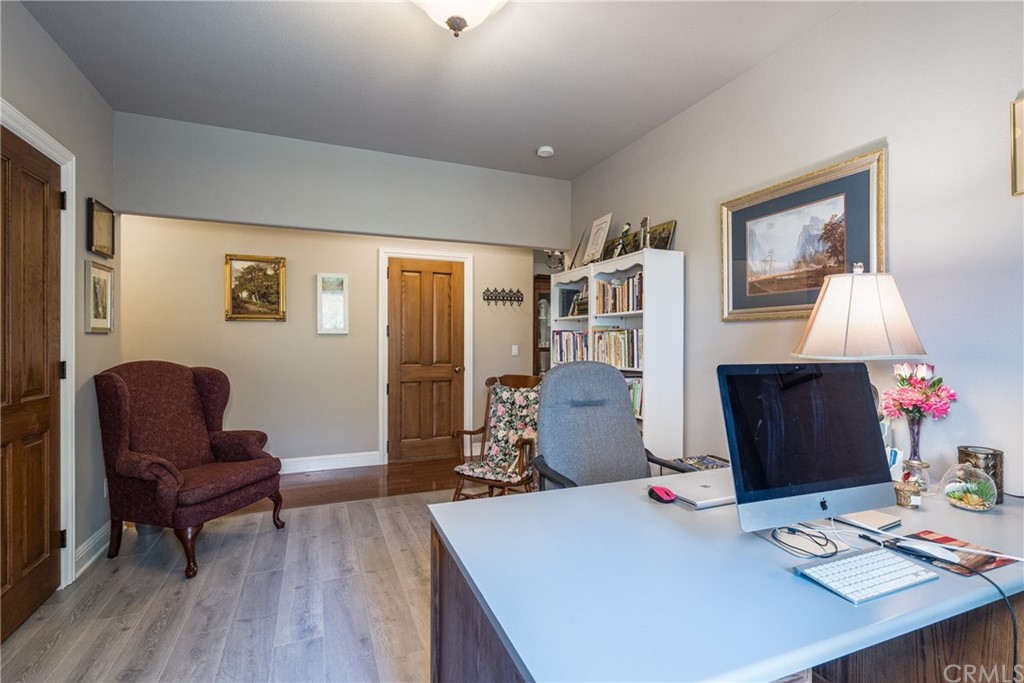 7703 Forest Drive Fish Camp, CA 93623 - Photo 21 of 48 a living room with furniture and a wooden floor