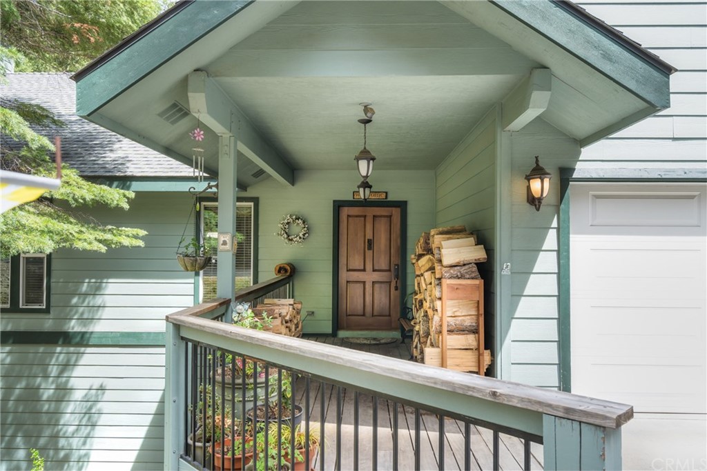 7703 Forest Drive Fish Camp, CA 93623 - Photo 4 of 48 a view of a building from a balcony